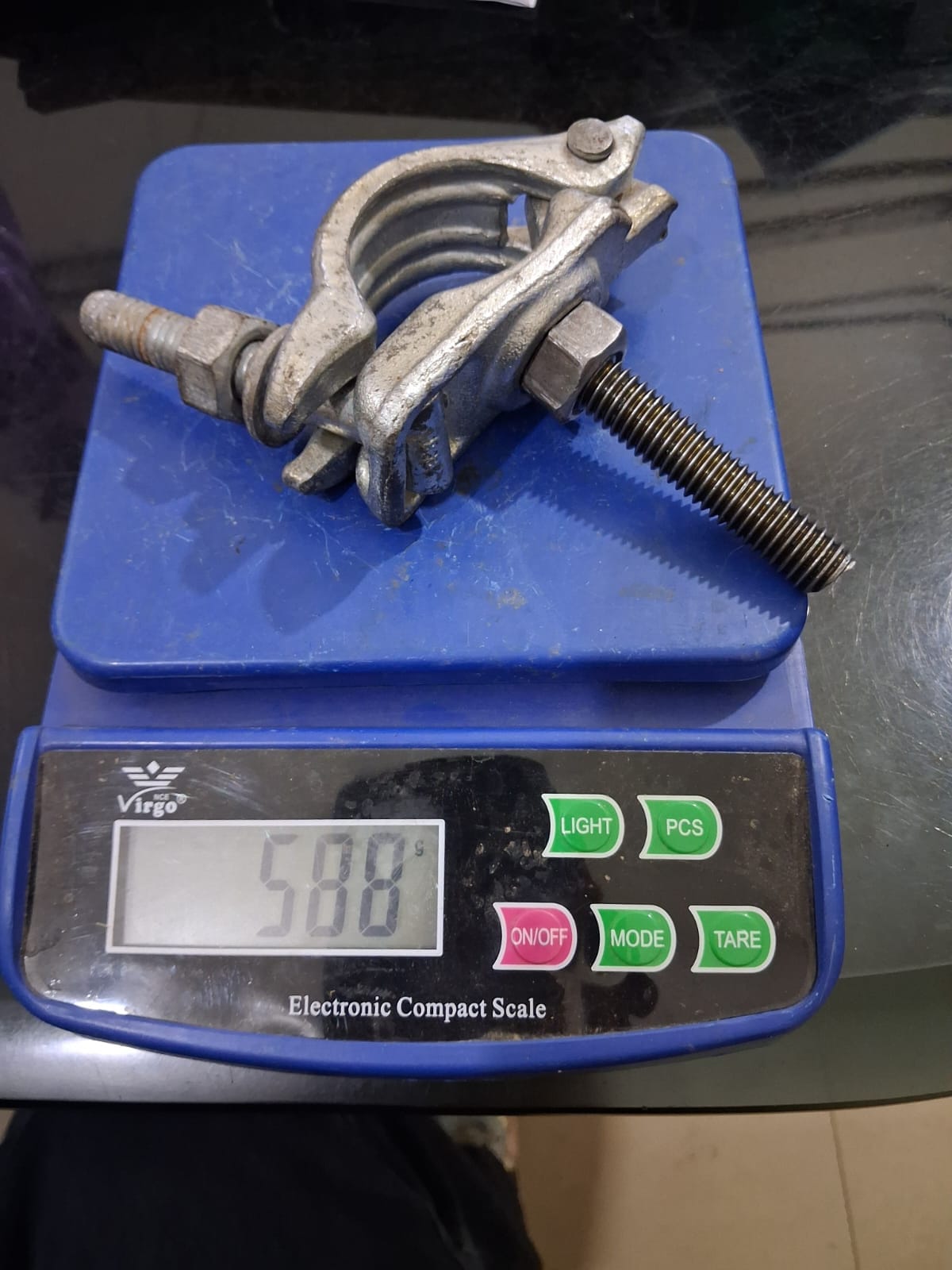 Zinc plated half coupler with toggle bolt weighing 588gm for scaffolding systems