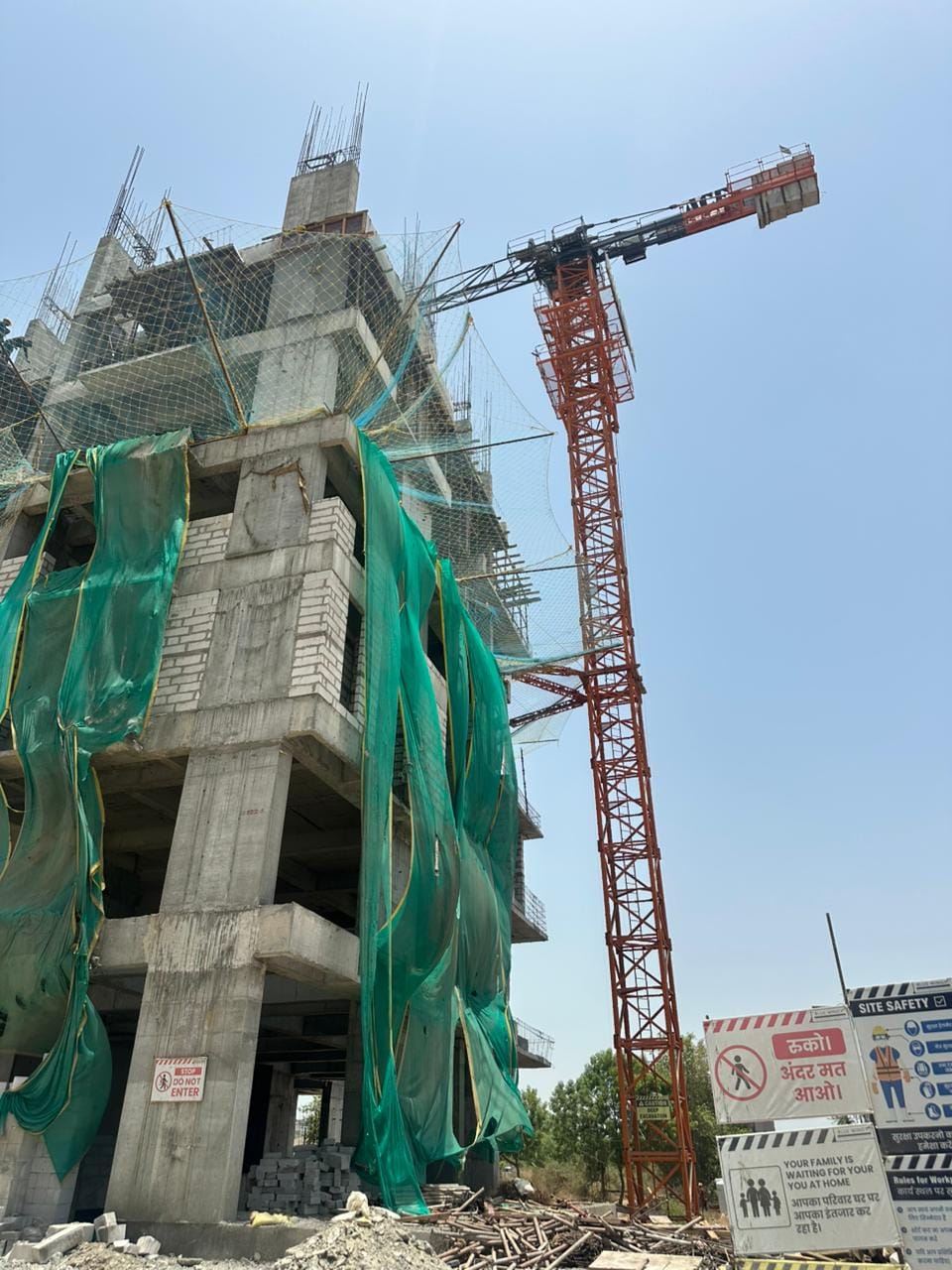 AMCO scaffolding accessories used at a residential construction site in Gujarat